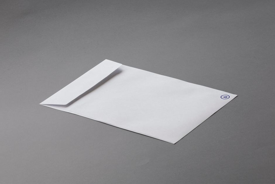 A white envelope on a neutral surface.
